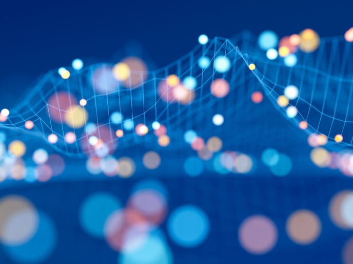 Abstract composition of dots to relay data connection featuring blue, pink and white dots.